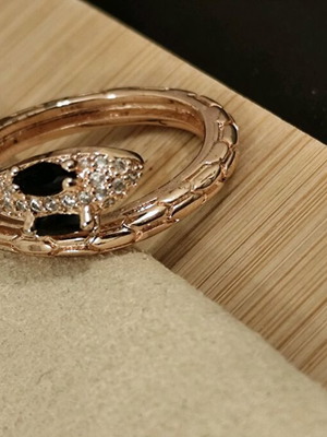 Ring in beautiful design made of stainless steel new, black and gold
