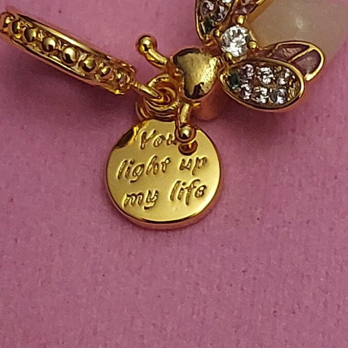 Charm bee pendant new with white and gold zirconia, glows in dark