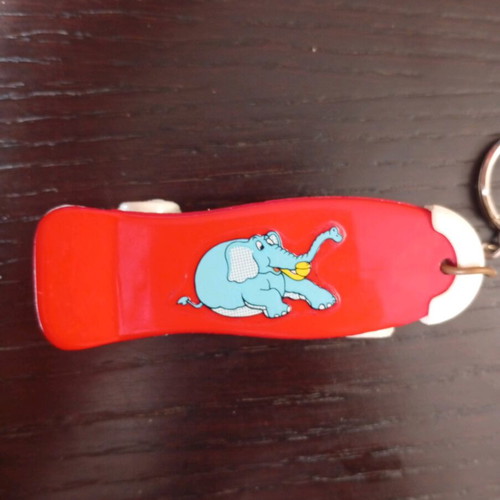 Mini skateboard keychain used with blue elephant design