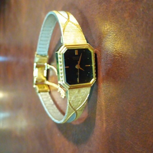 Orient women's watch used from the 90s, gold and silver