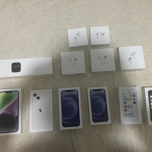 iPhone empty boxes set with AirPods and Apple Watch packaging
