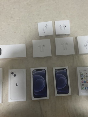 iPhone empty boxes set with AirPods and Apple Watch packaging