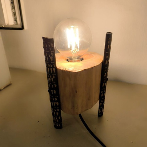 Handmade table lamp from solid wood trunk with carved black legs