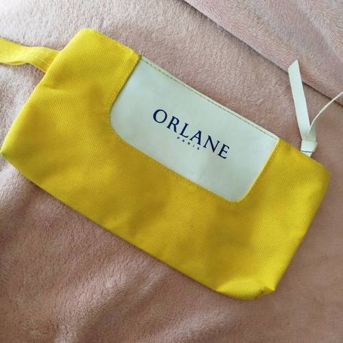 Orlane toiletry bag new, yellow