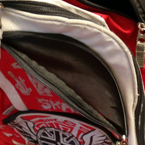 School bag used, red with multiple compartments