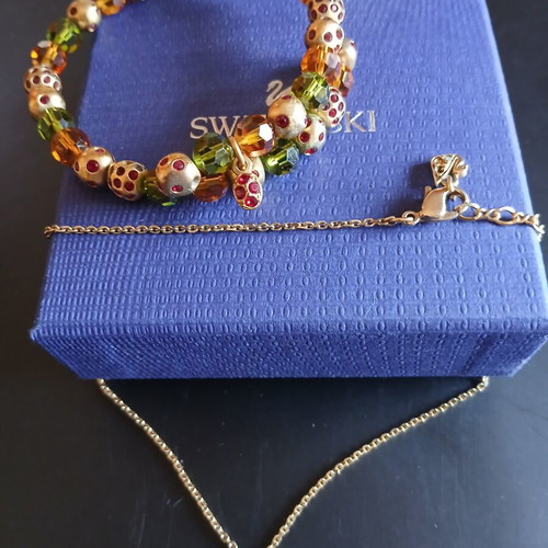 Swarovski necklace and bracelet set like new, gold color