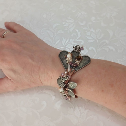 Russa handmade bracelet like new with floral and duck design