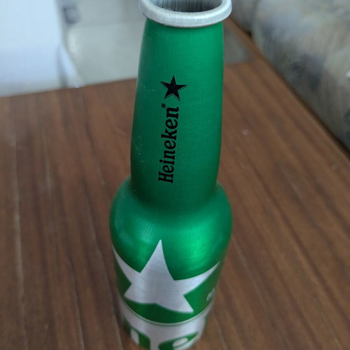 Heineken original empty aluminium bottle for collectors