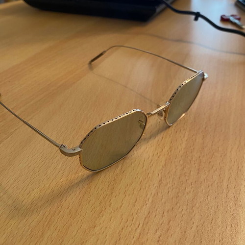 Oliver People Takumi sunglasses model TK-5 used with minor scratches