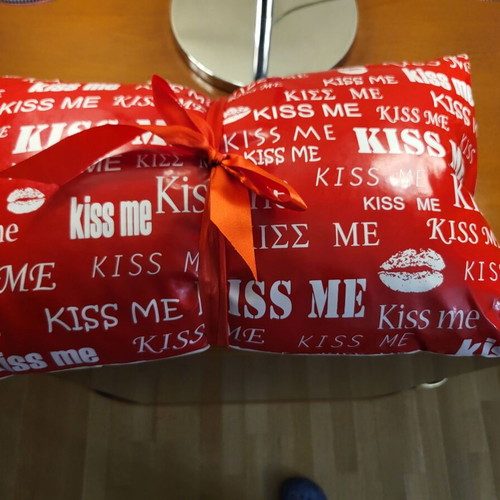 Plastic Kiss Me pillow new with ribbon
