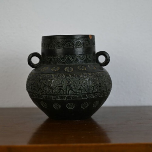 Decorative ceramic vase in ancient style with geometric motifs