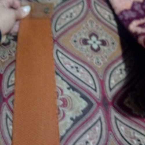Belt slightly used, light brown, elastic, size 115