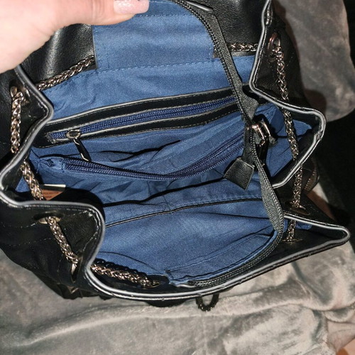 Backpack used, black with multiple pockets