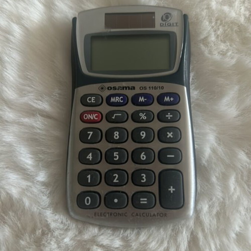 Calculator used, not working, may need battery