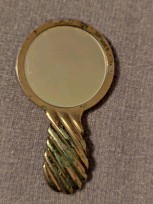 Estée Lauder vintage hand mirror used, gold tone