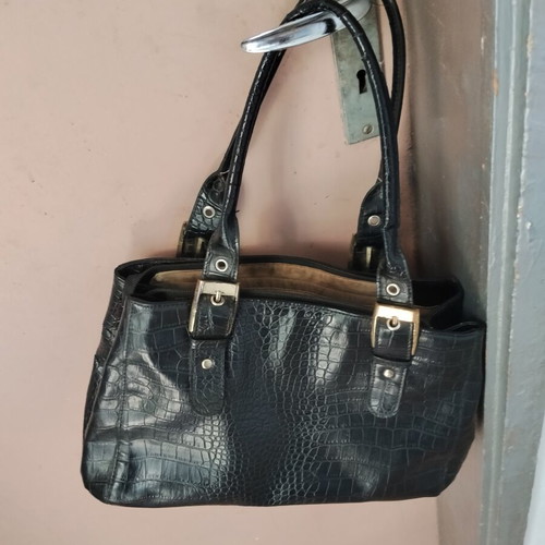 Vintage black women's shoulder bag with crocodile and snake texture, used