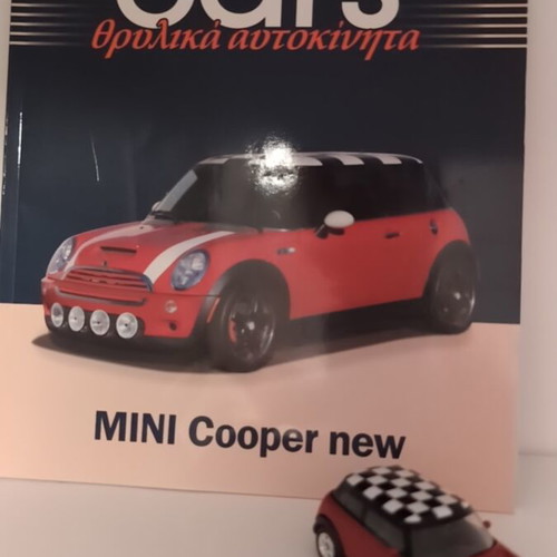 Mini Cooper New collectible with booklet and metal model