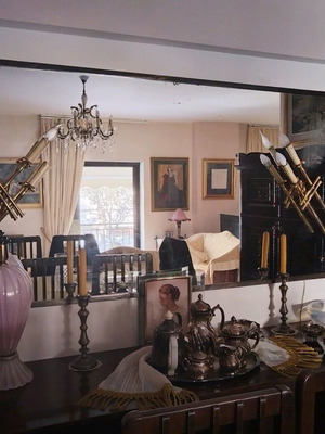 Old mirror used with brass frame and sconces