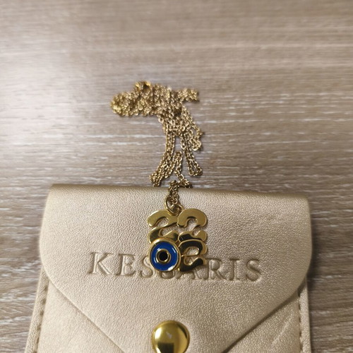 Pendant jewelry 2022 charm with eye, like new, gold color