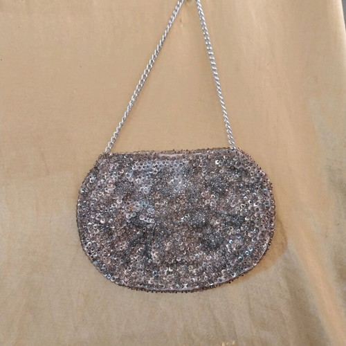 Women’s evening bag silver hand-held like new with beads and sequins
