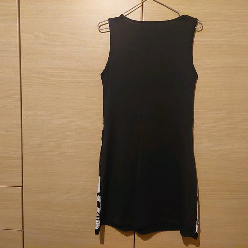 Rock dress black sequin with white skulls like new