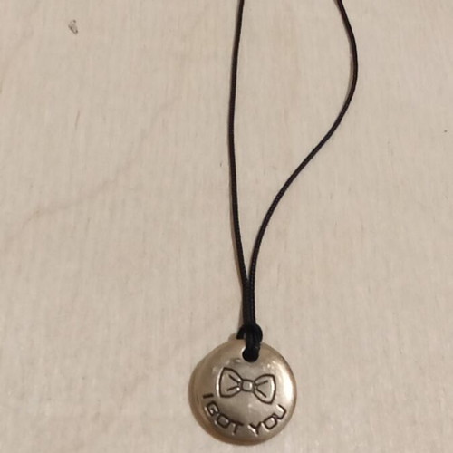 Small metal pendant with silver clasp refurbished
