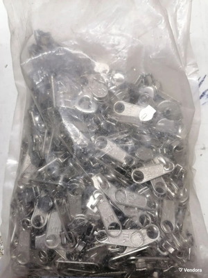 3 zipper rolls and aluminum zippers.. the rolls are about 120 meters and the aluminum ones are 100