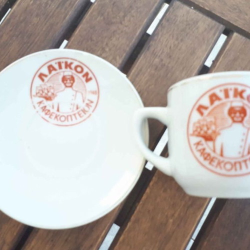 Cup and saucer used "LAIKON KAFEKOPTEION"