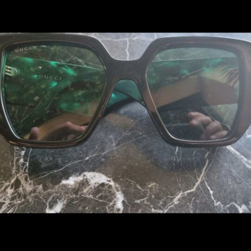 Gucci sunglasses authentic like new
