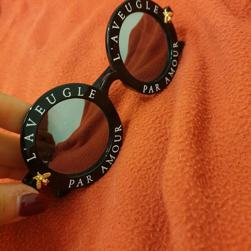 Round modern sunglasses new, black with gold detail