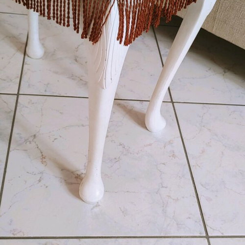 Small stool used with brown velvet and white wood