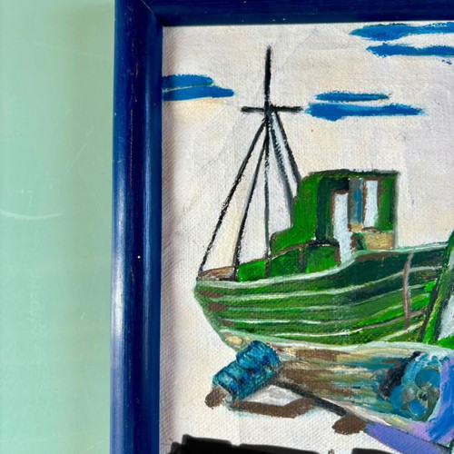Painting with nautical theme in blue wooden frame