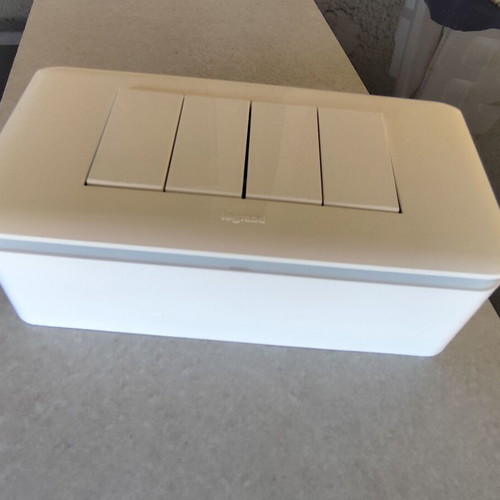 Legrand outdoor wall case with 4 relay toggle switches like new