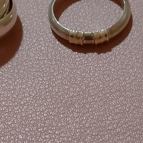 Silver 925 rings, one triple band and one with 585 gold tones