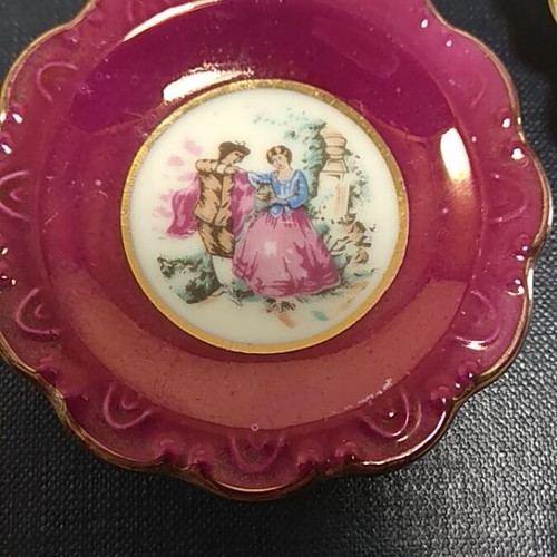 Set of 3 porcelain miniature plates used with romantic designs