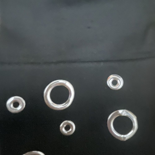 Black leggings with eyelets at the hem, capri design, new
