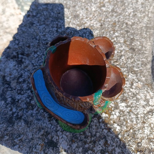 Clay cup holder/plant pot used, designed like a plane tree