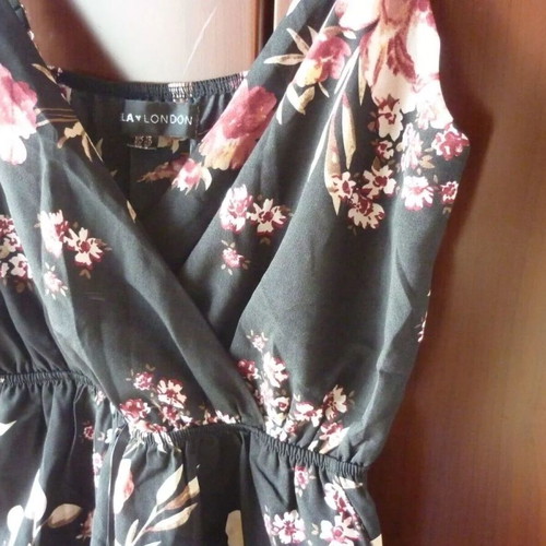 MELA LONDON floral print black jumpsuit medium used