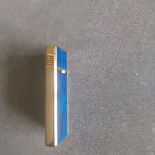 Sharp vintage lighter used with imperfections