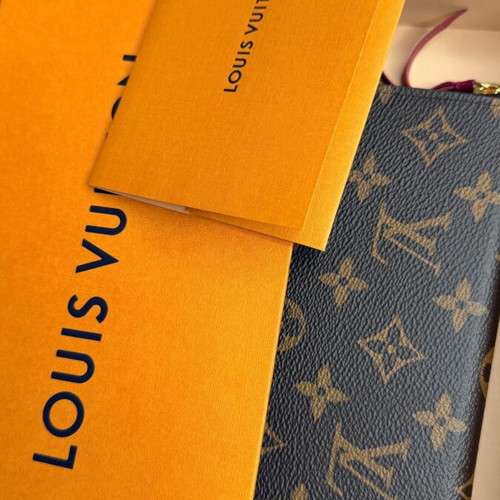 Louis Vuitton Clémence wallet used, monogram canvas with pink zipper