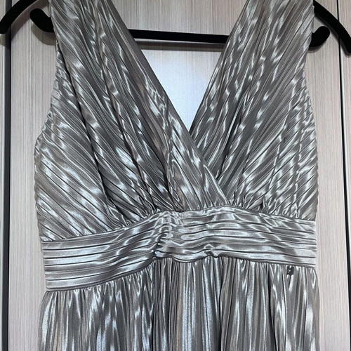 Kocca maxi metallic dress with pleated design and crossover neckline