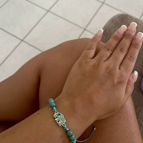 Handmade turquoise bracelet with elephant charm adjustable