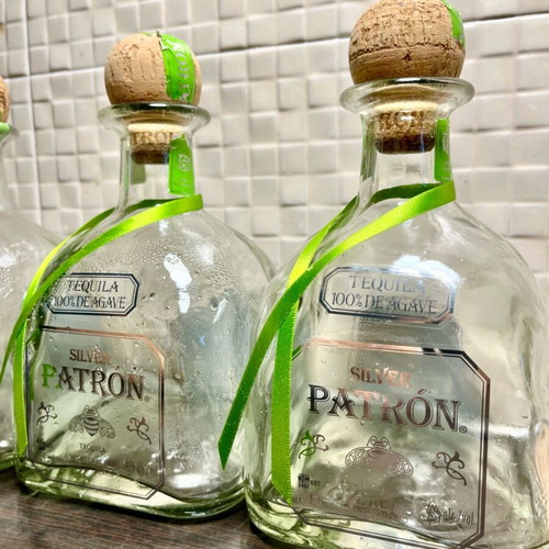 Patron champagne bucket like new with 4 empty silver bottles