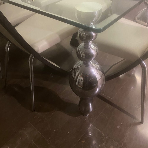 Glass dining table with 6 used Italian leather chairs, inox legs