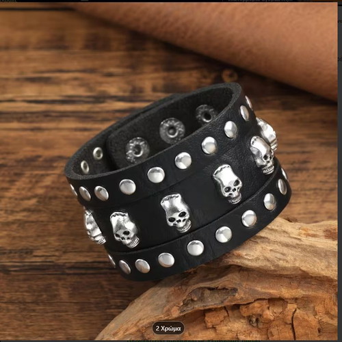 Leather bracelet new with studs and skulls black