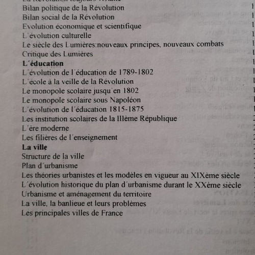 French language learning books used with handwritten notes
