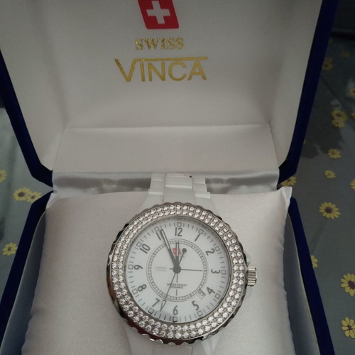 Swiss women's Vinca watch used and men's Weide watch gift