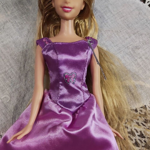 Disney Rapunzel Doll by Mattel used with color-changing hair highlights