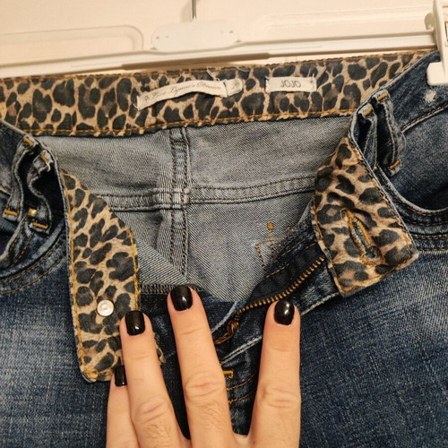 Lynne women's jeans like new with animal print and patches, size L