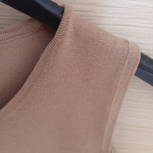 Beige vest used, size M